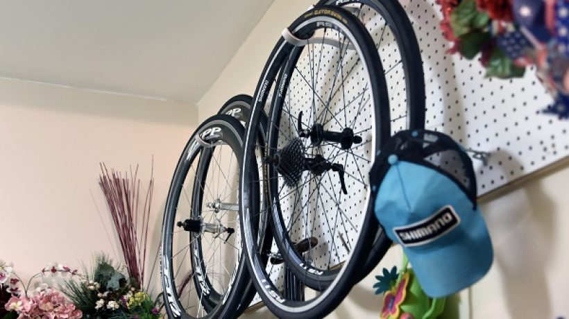 Is it OK to hang a bike by the wheel?
